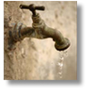 leaking faucet wastes water